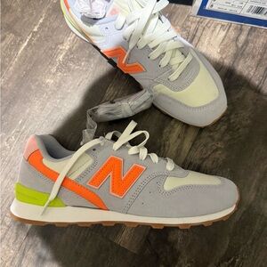 New Balance Womens Sneakers in Light Gray with Orange and Neon Yellow Accents